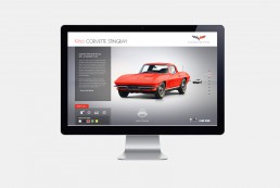 Desktop monitor showcasing a 1966 Red Vintage Chevrolet Corvette Stingray