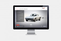 Desktop monitor showcasing a 1966 White Vintage Chevrolet Corvette Stingray